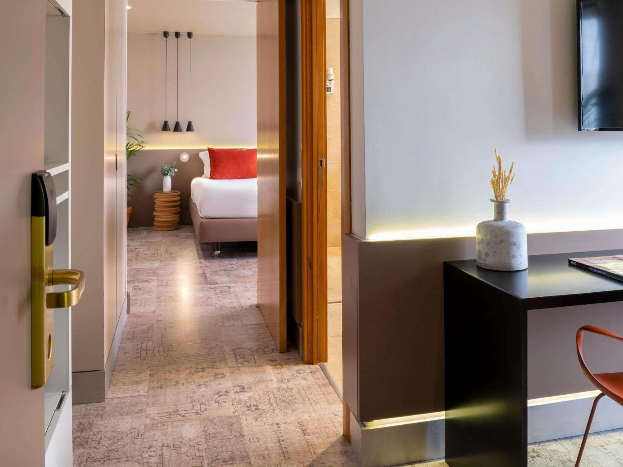 Quarto Superior com 2 Camas Individuais e Vista Cidade